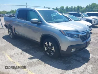 2020 Honda Ridgeline RTL with VIN 5FPYK3F5XLB019296, listed as a IAAI auction lot 42204290 with 48,197 mi miles and . Bid and sale history available at DreamBid. Image 1.