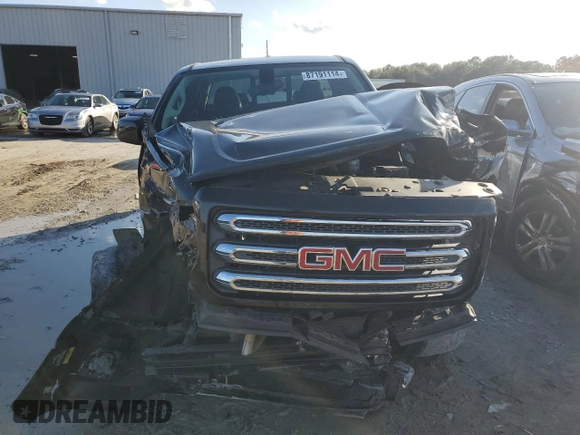 2015 GMC Canyon 4WD SLE with VIN 1GTH6BE33F1199189, listed as a Copart auction lot 87191114 with 199,477 mi miles and Salvage Title. Bid and sale history available at carsss.com. Image 5.