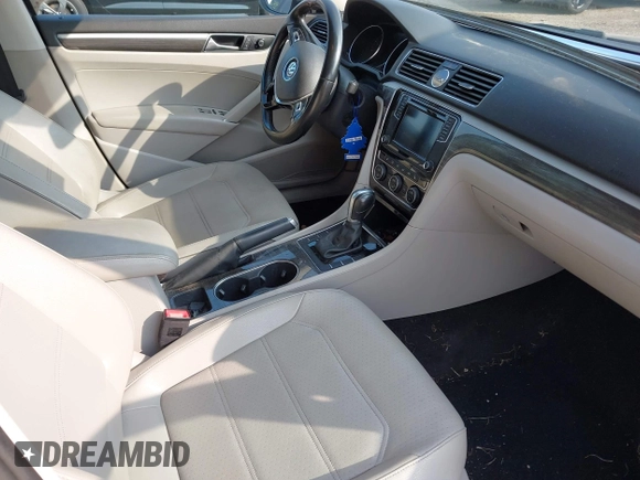 2017 Volkswagen Passat SE with VIN 1VWBT7A35HC063362, listed as a IAAI auction lot 42435453 with 76,341 mi miles and . Bid and sale history available at DreamBid. Image 5.