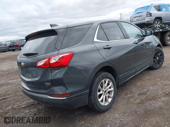 2019 Chevrolet Equinox LT with VIN 2GNAXKEV0K6230221, listed as a IAAI auction lot 42029818 with 63,190 mi miles and . Bid and sale history available at DreamBid. Image 4.