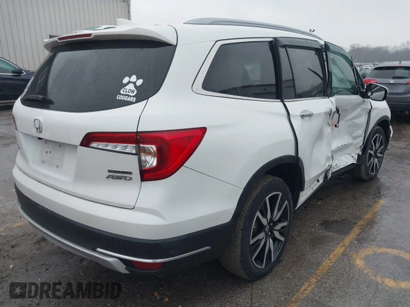 2021 Honda Pilot Touring 8-Passenger z VIN 5FNYF6H90MB031795, wystawiony jako IAAI lot #41207263 z przebiegiem 56 367 mil mil oraz . Historia ofert i sprzedaży dostępna na DreamBid. Obrazek 4.