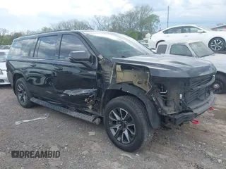 2022 Chevrolet Suburban z VIN 1GNSKDKL5NR218592, wystawiony jako IAAI lot #41989302 z przebiegiem 184 080 mil mil oraz . Historia ofert i sprzedaży dostępna na DreamBid. Obrazek 13.