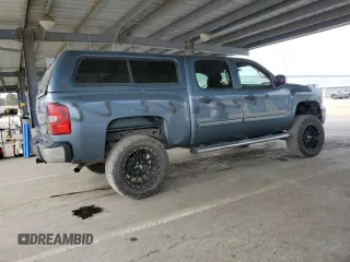 2011 Chevrolet Silverado 1500 LT with VIN 3GCPKSE3XBG378106, listed as a Copart auction lot 54523865 with 135,895 mi miles and Salvage Title. Bid and sale history available at DreamBid. Image 3.