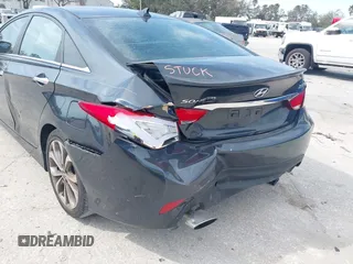 2014 Hyundai Sonata Limited with VIN 5NPEC4AB0EH935405, listed as a IAAI auction lot 41519802 with 159,707 mi miles and . Bid and sale history available at DreamBid. Image 6.