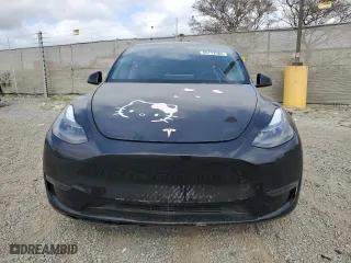 2023 Tesla Model Y Long Range with VIN 7SAYGAEE5PF880779, listed as a Copart auction lot 50777585 with 22,135 mi miles and Salvage Title. Bid and sale history available at carsss.com. Image 5.