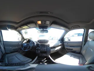 2013 Honda Pilot Touring with VIN 5FNYF3H94DB018384, listed as a IAAI auction lot 41672767 with 188,922 mi miles and . Bid and sale history available at DreamBid. Image 18.