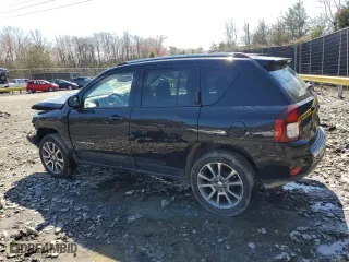 2017 Jeep Compass High Altitude with VIN 1C4NJCEA7HD125880, listed as a Copart auction lot 49104925 with 99,779 mi miles and Salvage Title. Bid and sale history available at carsss.com. Image 2.