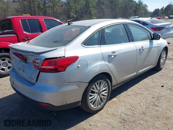 2017 Ford Focus Titanium с VIN 1FADP3J22HL230024, выставлен на аукционе IAAI как лот 41547566 с пробегом 146 969 миль миль и . История ставок и продаж доступна на DreamBid. Изображение 4.