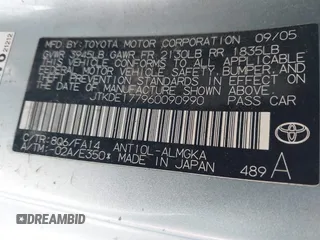 2006 Scion tC with VIN JTKDE177960090990, listed as a IAAI auction lot 41690362 with 197,613 mi miles. Bid and sale history available at carsss.com. Image 9.