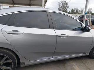 2019 Honda Civic Sport with VIN 2HGFC2F84KH576622, listed as a IAAI auction lot 41494019 with 87,495 mi miles and . Bid and sale history available at DreamBid. Image 14.