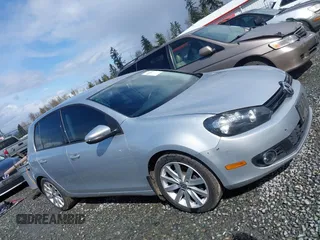 2013 Volkswagen Golf TDI z VIN WVWDM7AJ5DW083014, wystawiony jako IAAI lot #41923434 z przebiegiem 180 288 mil mil oraz . Historia ofert i sprzedaży dostępna na DreamBid. Obrazek 14.