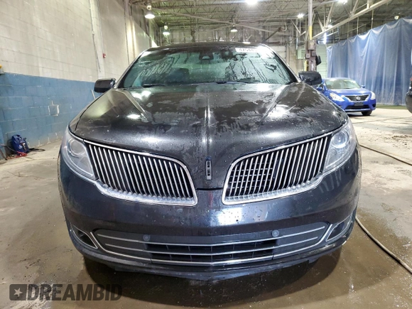 2014 Lincoln MKS z VIN 1LNHL9DK7EG610823, wystawiony jako Copart lot #47544585 z przebiegiem 131 176 mil mil oraz Czysty tytuł • Clean title. Historia ofert i sprzedaży dostępna na DreamBid. Obrazek 5.