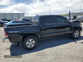 2015 Toyota Tacoma PreRunner with VIN 5TFJU4GN1FX074660, listed as a Copart auction lot 57364995 with 169,185 mi miles and Salvage title. Bid and sale history available at DreamBid. Image 3.