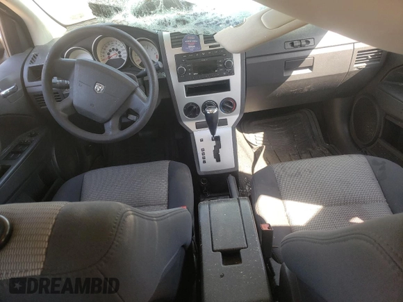2009 Dodge Caliber SXT with VIN 1B3HB48A69D150199, listed as a Copart auction lot 51043165 with 218,125 mi miles and Clean Title. Bid and sale history available at DreamBid. Image 8.