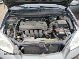 2006 Toyota Matrix STD z VIN 2T1KR32E56C587593, wystawiony jako Copart lot #73190904 z przebiegiem 229 338 mil mil oraz Nie do naprawy • Non repairable. Historia ofert i sprzedaży dostępna na DreamBid. Obrazek 11.