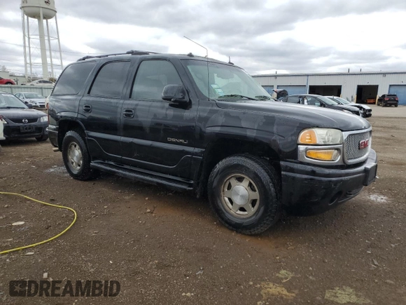 2003 GMC Yukon Denali z VIN 1GKEK63U43J263449, wystawiony jako Copart lot #53848345 z przebiegiem 144 280 mil mil oraz Szkody całkowita. Historia ofert i sprzedaży dostępna na DreamBid. Obrazek 4.