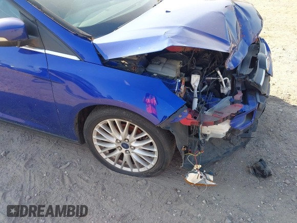2014 Ford Focus Titanium with VIN 1FADP3J26EL179266, listed as a IAAI auction lot 42712701 with 157,897 mi miles and . Bid and sale history available at DreamBid. Image 13.