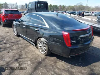 2014 Cadillac XTS Luxury with VIN 2G61M5S3XE9202454, listed as a IAAI auction lot 42025883 with 93,977 mi miles and . Bid and sale history available at DreamBid. Image 3.