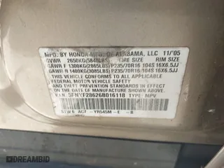 2006 Honda Pilot EX-L with RES with VIN 5FNYF28626B016118, listed as a IAAI auction lot 41819365 with 314,954 mi miles. Bid and sale history available at carsss.com. Image 9.