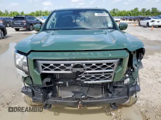2022 Nissan Frontier Pro-4X with VIN 1N6ED1EK5NN691351, listed as a Copart auction lot 65206915 with 64,610 mi miles and Salvage title. Bid and sale history available at DreamBid. Image 5.