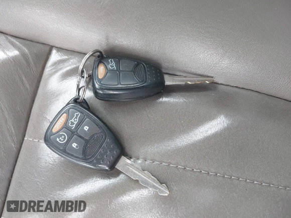 2007 Jeep Grand Cherokee Laredo z VIN 1J8HR48P77C548578, wystawiony jako IAAI lot #41974603 z przebiegiem 179 280 mil mil oraz . Historia ofert i sprzedaży dostępna na DreamBid. Obrazek 11.