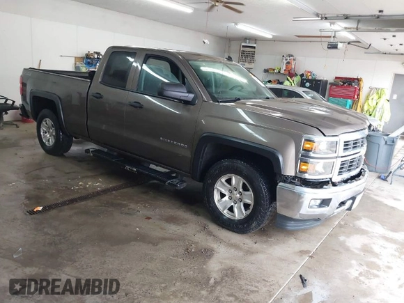2014 Chevrolet Silverado 1500 LT with VIN 1GCVKREC5EZ147506, listed as a IAAI auction lot 41736960 with 112,399 mi miles and . Bid and sale history available at DreamBid. Image 1.