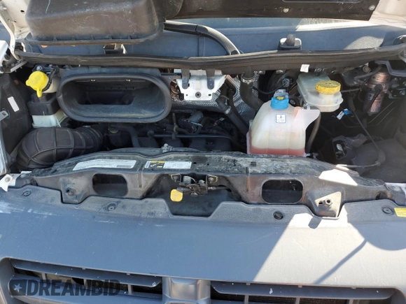 2018 Ram ProMaster Cargo with VIN 3C6TRVAGXJE105060, listed as a Copart auction lot 52821724 with 100,477 mi miles and Salvage Title. Bid and sale history available at DreamBid. Image 12.