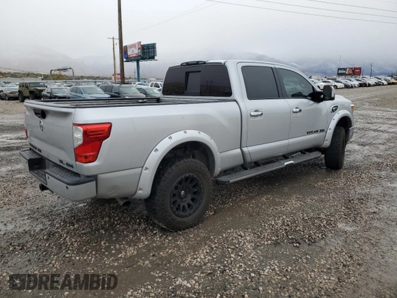 2016 Nissan Titan XD PRO-4X with VIN 1N6BA1F45GN517682, listed as a Copart auction lot 79774674 with 149,675 mi miles and Salvage Title. Bid and sale history available at carsss.com. Image 3.