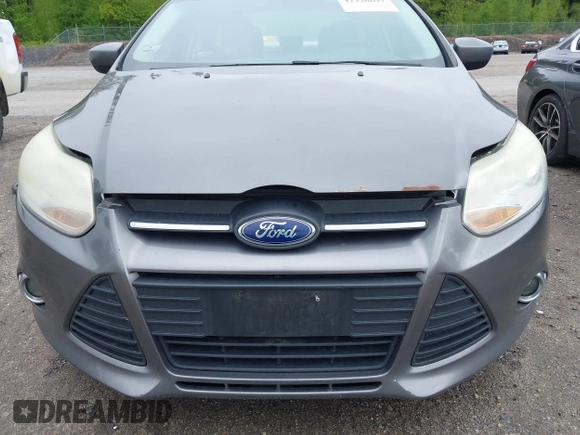 2012 Ford Focus SE with VIN 1FAHP3F2XCL458016, listed as a IAAI auction lot 42320697 with 235,248 mi miles and . Bid and sale history available at DreamBid. Image 12.