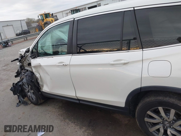 2019 Honda Pilot EX-L with VIN 5FNYF6H59KB075577, listed as a IAAI auction lot 41863841 with 102,242 mi miles and . Bid and sale history available at carsss.com. Image 14.