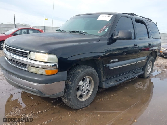 2003 Chevrolet Tahoe LT with VIN 1GNEC13Z83R264751, listed as a IAAI auction lot 41898933 with 300,977 mi miles. Bid and sale history available at carsss.com. Image 2.