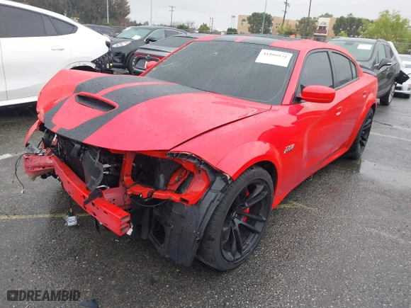 2022 Dodge Charger Scat Pack with VIN 2C3CDXGJ7NH229307, listed as a IAAI auction lot 41808821 with 12,184 mi miles. Bid and sale history available at carsss.com. Image 2.