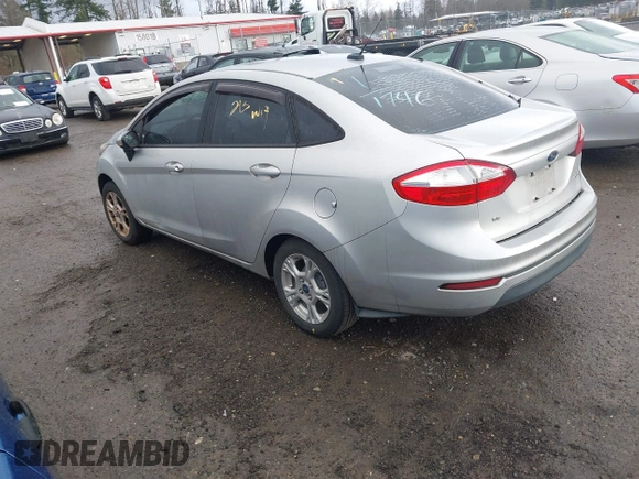2015 Ford Fiesta SE with VIN 3FADP4BJ7FM136387, listed as a IAAI auction lot 41671370 with 181,973 mi miles. Bid and sale history available at carsss.com. Image 3.