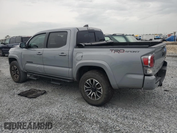 2020 Toyota Tacoma SR5 with VIN 3TMAZ5CNXLM121344, listed as a Copart auction lot 59393395 with 69,902 mi miles and Salvage title. Bid and sale history available at DreamBid. Image 2.