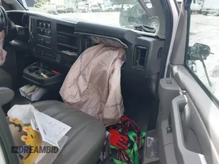 2021 Chevrolet Express Cargo with VIN 1GCWGBFP9M1258233, listed as a IAAI auction lot 41921251 with 96,729 mi miles and . Bid and sale history available at DreamBid. Image 5.