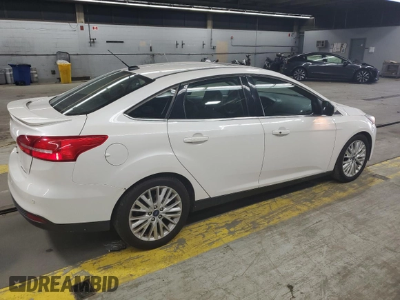2017 Ford Focus Titanium with VIN 1FADP3J25HL213184, listed as a Copart auction lot 61653155 with 120,883 mi miles and Clean title. Bid and sale history available at DreamBid. Image 3.