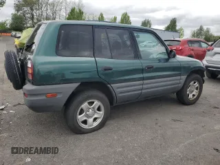 1999 Toyota RAV4 with VIN JT3GP10V2X0037464, listed as a Copart auction lot 54732085 with 306,550 mi miles and Clean Title. Bid and sale history available at DreamBid. Image 3.
