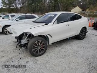 2021 BMW X6 xDrive40i z VIN 5UXCY6C01M9H63412, wystawiony jako Copart lot #46603325 z przebiegiem 38 143 mil mil oraz Szkoda całkowita • Salvage title. Historia ofert i sprzedaży dostępna na DreamBid. Obrazek 1.
