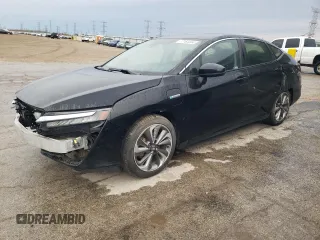2018 Honda Clarity Plug-In Hybrid with VIN JHMZC5F14JC018446, listed as a Copart auction lot 77164344 with 61,741 mi miles and Salvage Title. Bid and sale history available at carsss.com. Image 1.