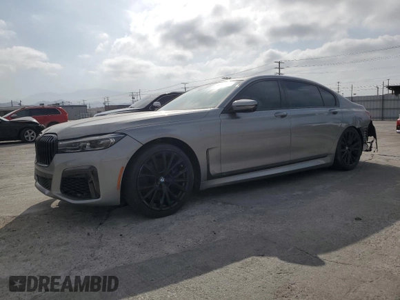 2022 BMW 7 Series 740i with VIN WBA7T2C02NCG97593, listed as a Copart auction lot 61861765 with 27,637 mi miles and Clean title. Bid and sale history available at DreamBid. Image 1.