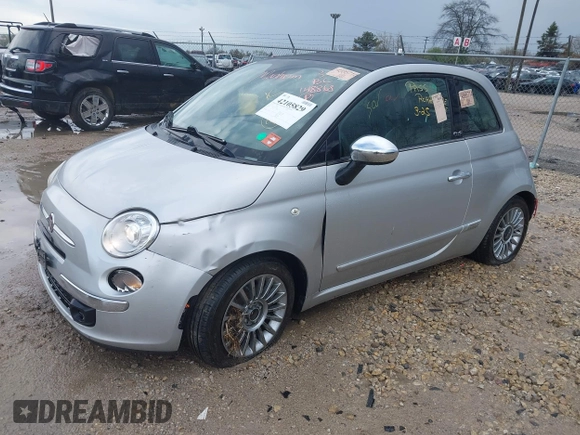 2012 FIAT 500 Lounge with VIN 3C3CFFER1CT148868, listed as a IAAI auction lot 42105829 with 82,746 mi miles and . Bid and sale history available at DreamBid. Image 2.