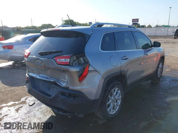 2016 Jeep Cherokee Latitude with VIN 1C4PJMCB5GW218166, listed as a IAAI auction lot 40458497 with 145,272 mi miles and . Bid and sale history available at carsss.com. Image 4.