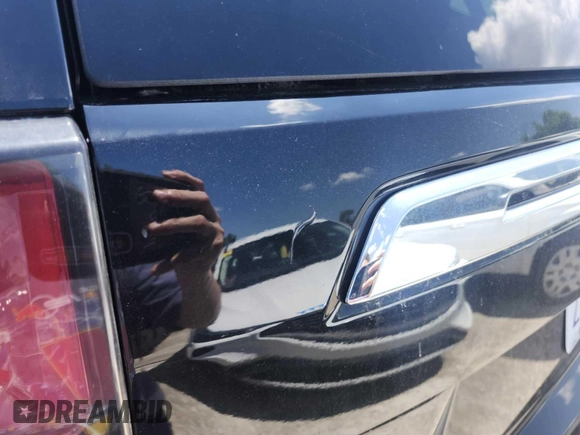 2023 Chevrolet Tahoe LS with VIN 1GNSKMKD8PR221675, listed as a IAAI auction lot 42796201 with 52,002 mi miles and . Bid and sale history available at DreamBid. Image 2.