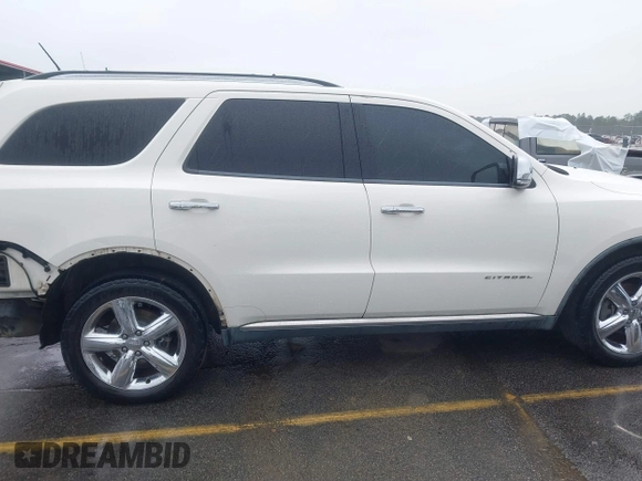 2011 Dodge Durango Citadel with VIN 1D4RD5GGXBC653192, listed as a IAAI auction lot 41727655 with 118,452 mi miles and . Bid and sale history available at DreamBid. Image 14.