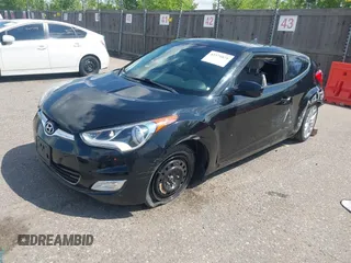 2013 Hyundai Veloster w/Gray Int with VIN KMHTC6AD1DU154946, listed as a IAAI auction lot 42375871 with 108,095 mi miles and . Bid and sale history available at DreamBid. Image 2.