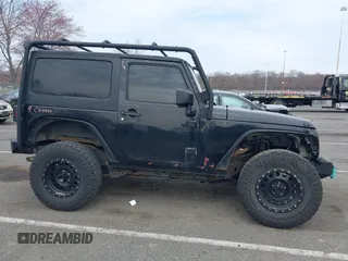 2014 Jeep Wrangler Sport с VIN 1C4AJWAG3EL288604, выставлен на аукционе IAAI как лот 41902520 с пробегом 159 116 миль миль и . История ставок и продаж доступна на DreamBid. Изображение 13.