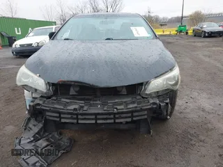 2015 Toyota Camry XLE with VIN 4T1BF1FK1FU087653, listed as a IAAI auction lot 41942940 with 180,274 mi miles. Bid and sale history available at carsss.com. Image 12.