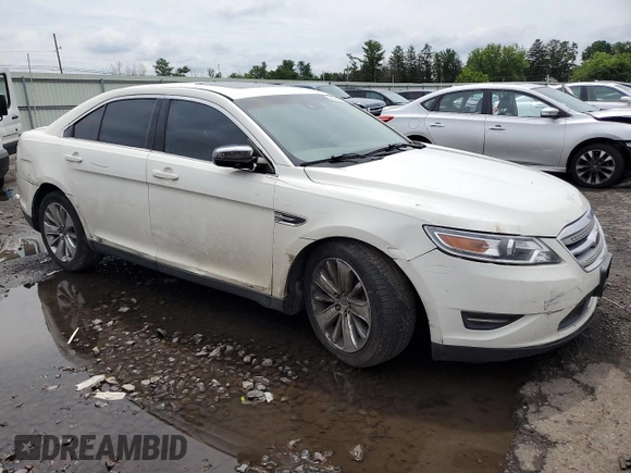 2010 Ford Taurus Limited with VIN 1FAHP2FW7AG127476, listed as a Copart auction lot 62399455 with 140,761 mi miles and Salvage title. Bid and sale history available at DreamBid. Image 4.