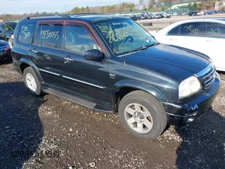 2003 Suzuki XL7 Touring z VIN JS3TX92VX34114687, wystawiony jako IAAI lot #40988145 z przebiegiem Nie podano mil oraz . Historia ofert i sprzedaży dostępna na DreamBid. Obrazek 1.