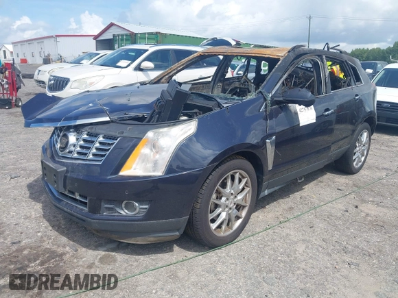 2014 Cadillac SRX Performance Collection with VIN 3GYFNCE31ES599632, listed as a IAAI auction lot 42757876 with Not provided miles and . Bid and sale history available at DreamBid. Image 2.